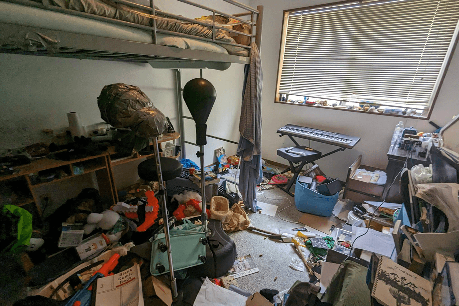 Cluttered kid’s room, before